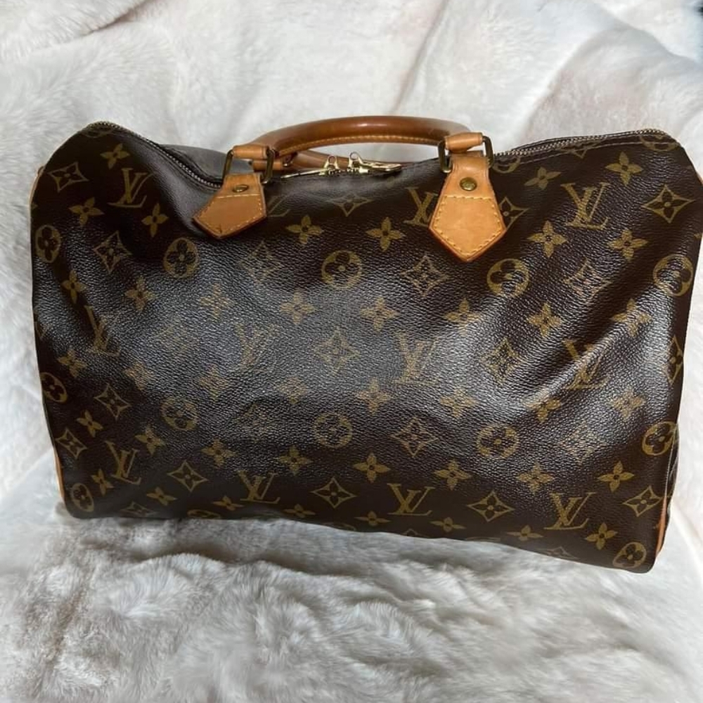 Auth Year 2012 Louis Vuitton Speedy 35 bandouliere monogram.